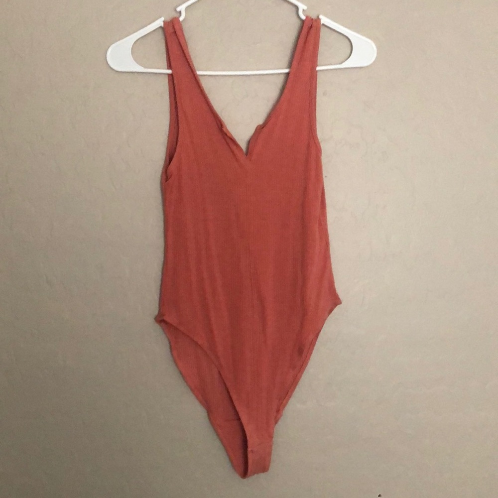 Pink urban outfitters bodysuit